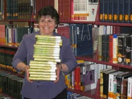 Marilyn Gray with books.