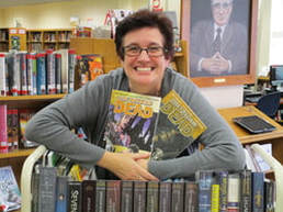 Christine Smith with books.